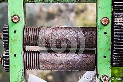 Old rusty axle shaft of sugarcane juice machine manual Stock Photo