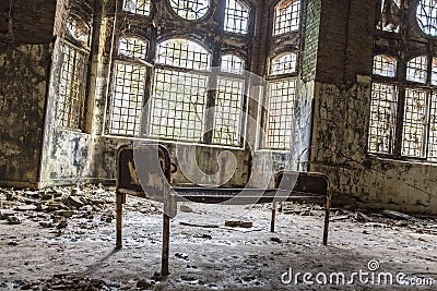 Old rusty bed in ruinous house Stock Photo