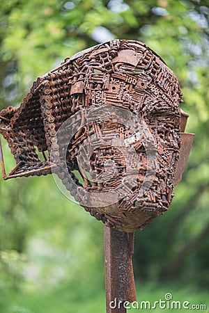 Old rusty broken parts used for artistic sculpture composition Editorial Stock Photo