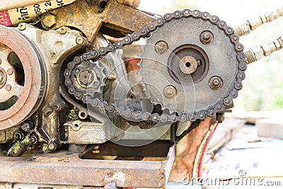 Old and rusty cogwheels with chain Stock Photo