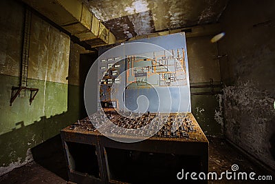 Old rusty control panel in old underground military bunker Stock Photo