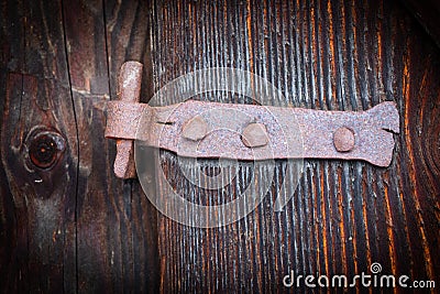 Old rusty door hinge Stock Photo
