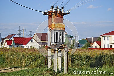 Old rusty electrical distribution transformer Stock Photo