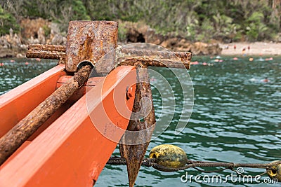 Old rusty folding grapnel anchor Stock Photo