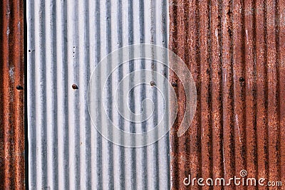 old rusty galvanized. wheathered rust and scratched steel texture corrugated iron siding vintage background. Stock Photo