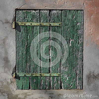 Old rusty green wood shutter Stock Photo