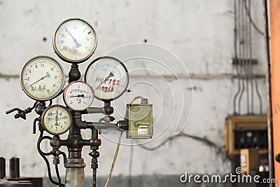 Old rusty industrial gauges Stock Photo