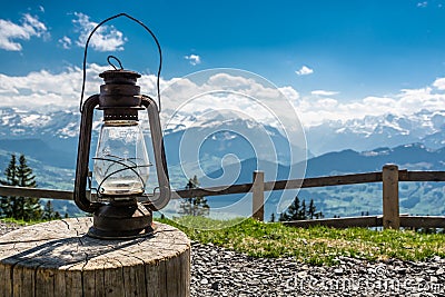 Old rusty lantern near camping place on Wildspitz peak in Switzerland Stock Photo