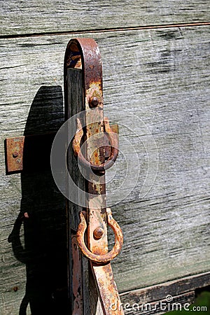 Old rusty latch on side of wagon Stock Photo
