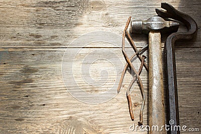 Old rusty nails and hammer Stock Photo