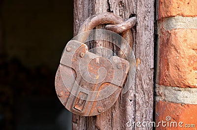 Old rusty padlock. Stock Photo