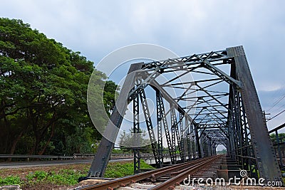 Old rusty railroad in the sunny day with tree and sky shot in side view Stock Photo