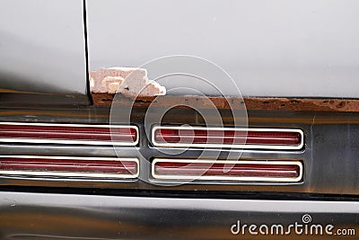 Old rusty rearlight of a classic car retro Stock Photo