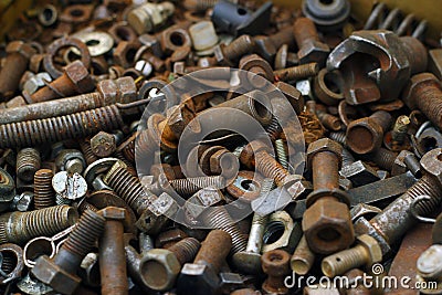 Old rusty screws, nuts and bolts background Stock Photo
