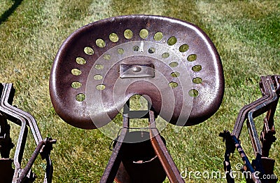 The seat and levers of a horse pulled field cultivator Stock Photo