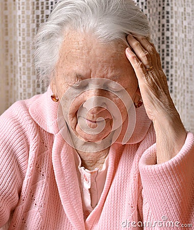 Old sad woman Stock Photo