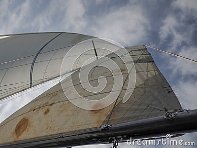 old sailboat sheet winch sail detail Yachting. Sailing winch and rope of a yacht. Sheet. Cable. pulley Stock Photo