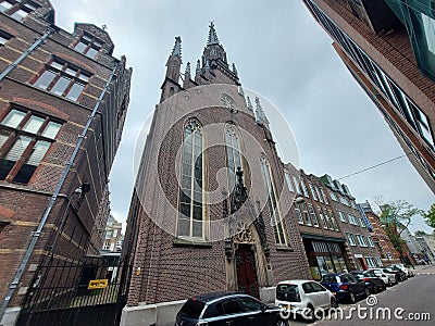 Old School and Reformed German church in the Lange Hout straat in the Netherlands Editorial Stock Photo