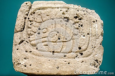 Ancient mayan glyph made of stone Stock Photo