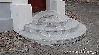 Old semi-circular steps on the street to the pharmacy Stock Photo