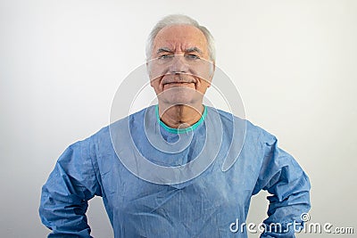 Old senior man male surgeon uniform doctor profession help people smile Stock Photo