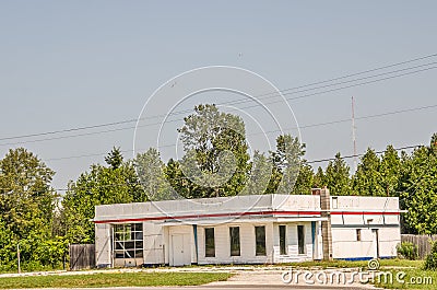 Old Service Station with Red Accent Stock Photo