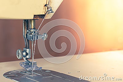 Old sewing machine needle head Stock Photo