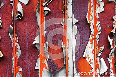 Old shabby surface with metal orange rods. Stock Photo