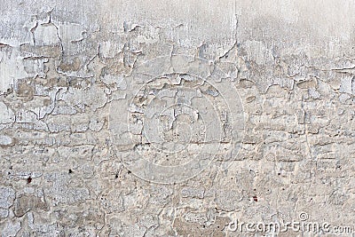 Old shabby wall with flaky paint and a lot of cracks Stock Photo