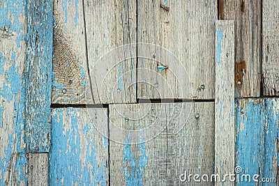 Old shabby wooden background with flaking blue paint Stock Photo