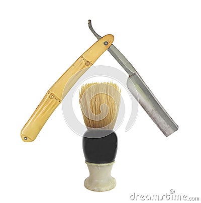 Old shaving brush and straight razor Stock Photo