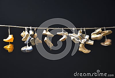 Old shoes hanging on a wire Editorial Stock Photo