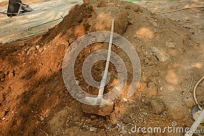 old shovel thrown in the ground Stock Photo