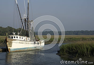 Old Shrimp Boat at Dock Stock Photo