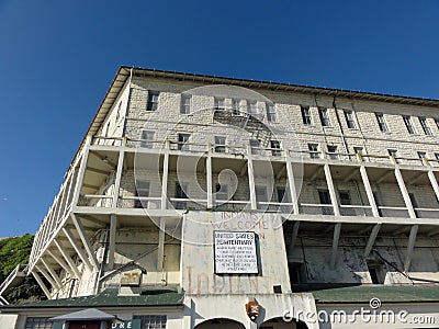 Old sign on Alcatraz Penitentiary building Stock Photo