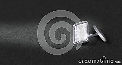 Old silver cufflink Stock Photo