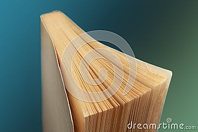 Old single book on gradient background Stock Photo