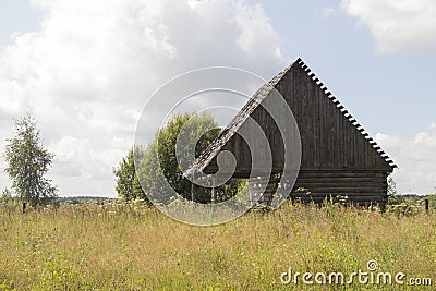 Old small abandoned and ruinous country house in Russia Stock Photo