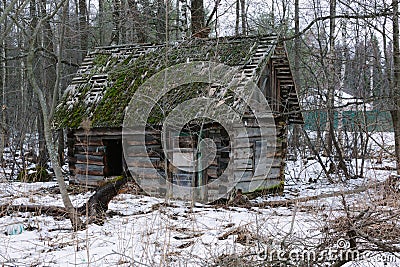 Old small abandoned and ruinous country house in russia. Stock Photo