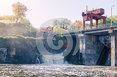 An old small dam with one open gateway Stock Photo