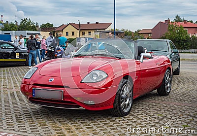 Old small nice Italian sports roadster car Fiat Barchetta parked Editorial Stock Photo