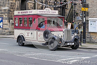 Old red and cream tour bus Editorial Stock Photo