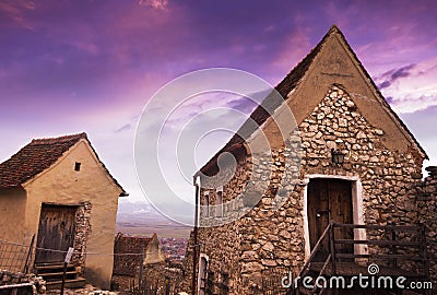 Old small stone houses at Rasnov medieval citadel from Transylvania Stock Photo