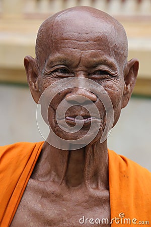 Old smiling buddhist monk Editorial Stock Photo