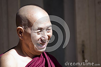 Old Smiling Monk Editorial Stock Photo