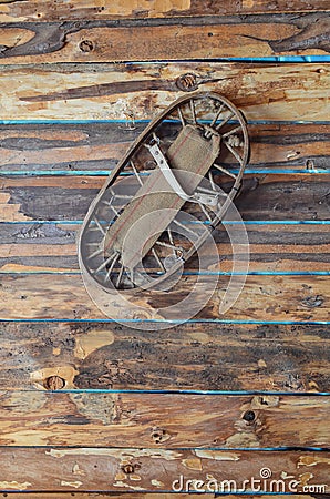 Old snowshoe as wall decoration Stock Photo