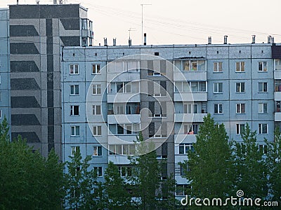 Old Soviet apartment building. Fragment of the facade Stock Photo
