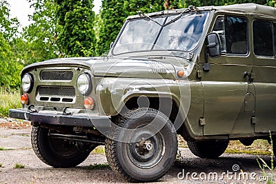 Old Soviet car, a green SUV for safari Stock Photo