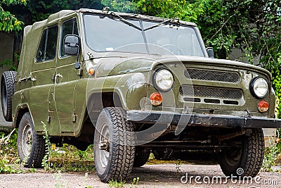 An old Soviet car, a green SUV for hunting Stock Photo