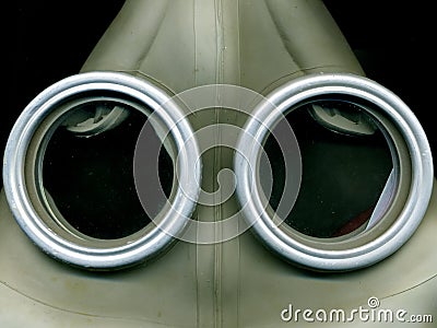 Old Soviet green gas mask. The eye of an old gas mask. postapocalypse. Stock Photo
